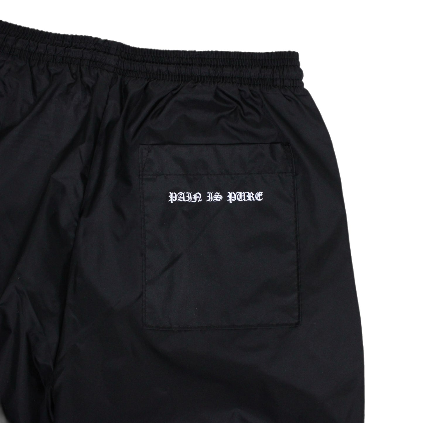 PAIN IS PURE ‘PURE’ SIDE LOGO SKULL NYLON PANTS BLACK/WHITE