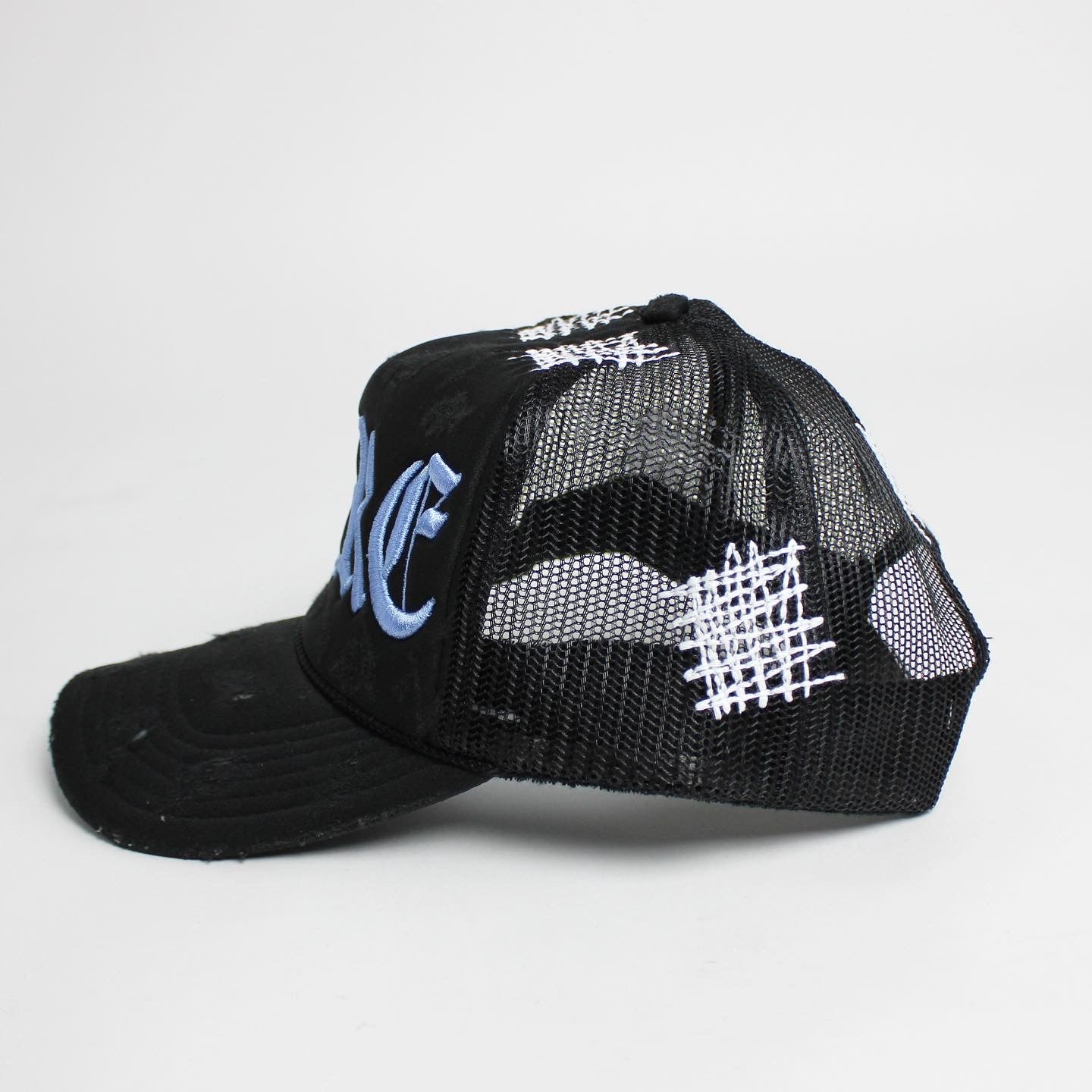 PAIN IS PURE 'PURE' LOGO NEEDLE REPAIR TRUCKER HAT BLACK/BLUE