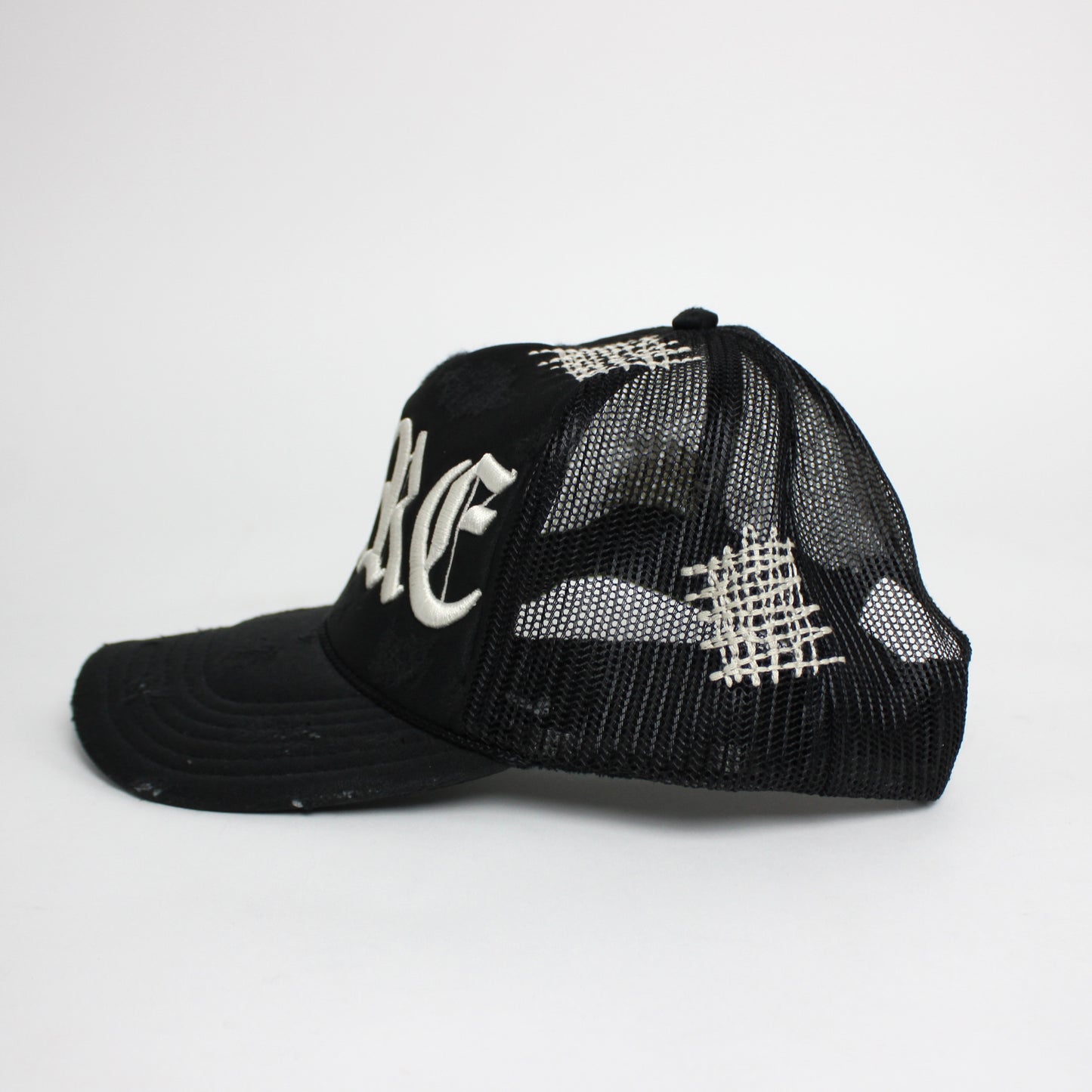 PAIN IS PURE 'PURE' LOGO NEEDLE REPAIR TRUCKER HAT BLACK/CREAM