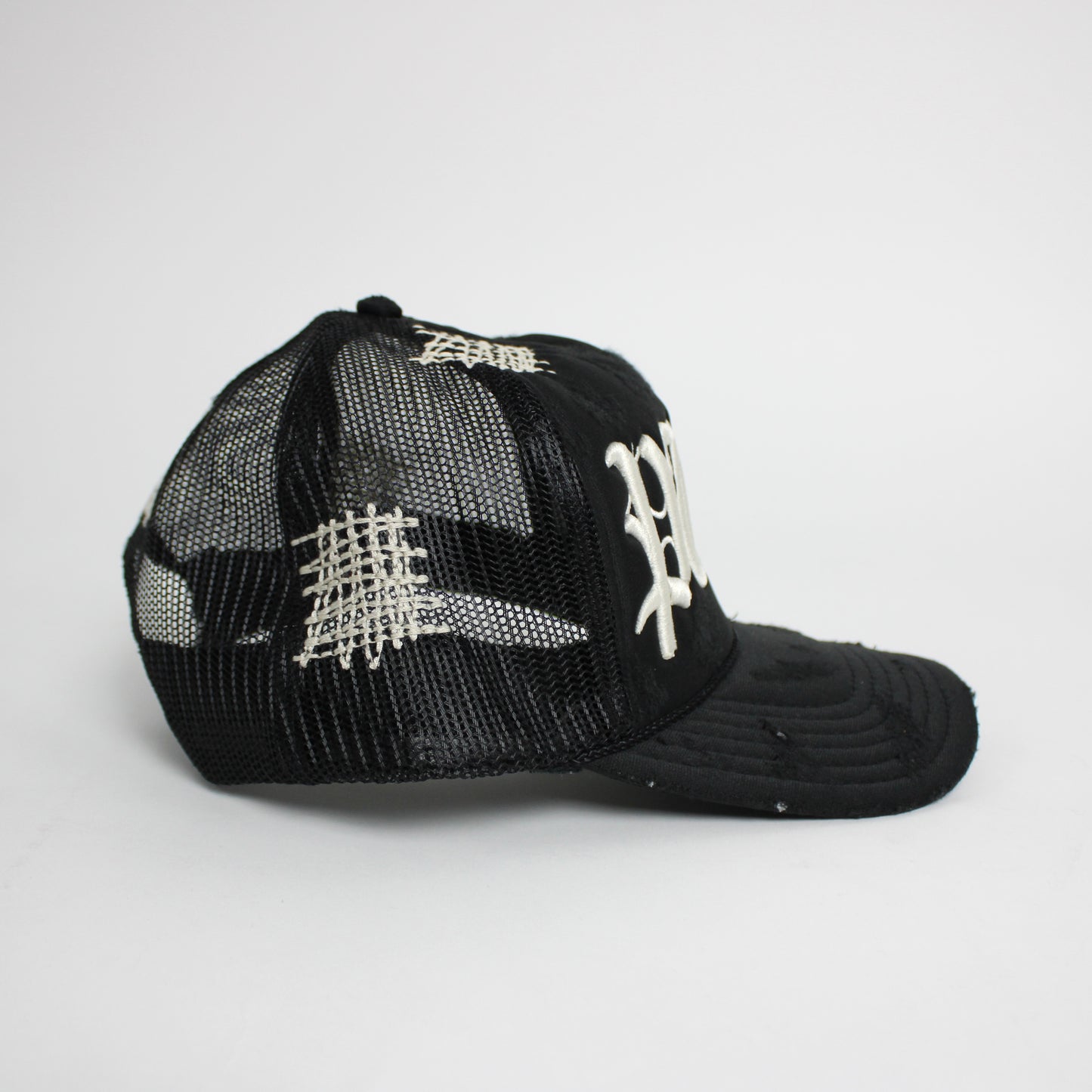 PAIN IS PURE 'PURE' LOGO NEEDLE REPAIR TRUCKER HAT BLACK/CREAM